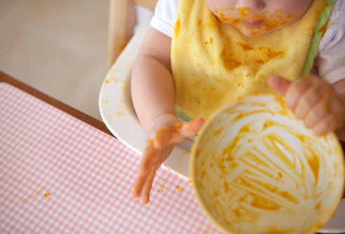 getty_rm_photo_of_messy_baby_in_highchair