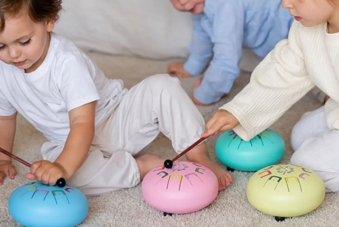 Instrument, bębenek dla dzieci do terapii muzycznej Baby Tambu niebieski