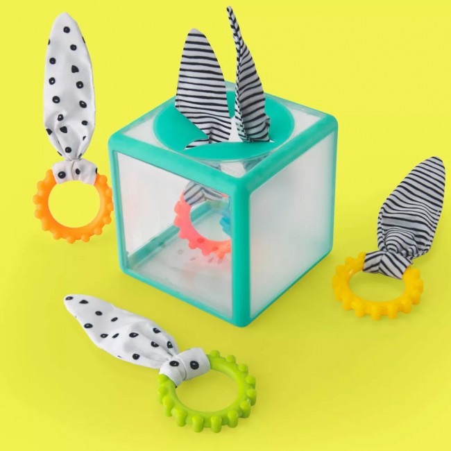 Manipulacyjna kostka sensoryczna Montessori Sassy - Elastyczna kostka sorter z krążkami