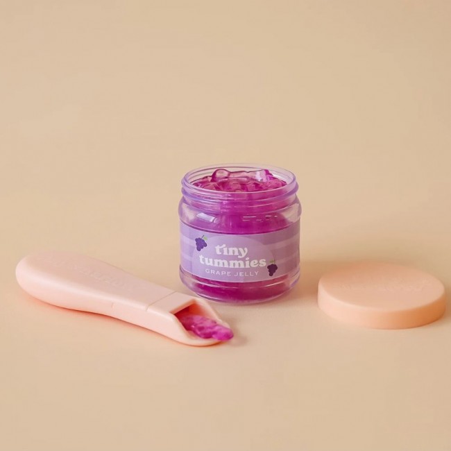 Magiczny słoiczek Tiny Tummies z łyżeczką do karmienia lalek Tiny Harlow - Winogrono